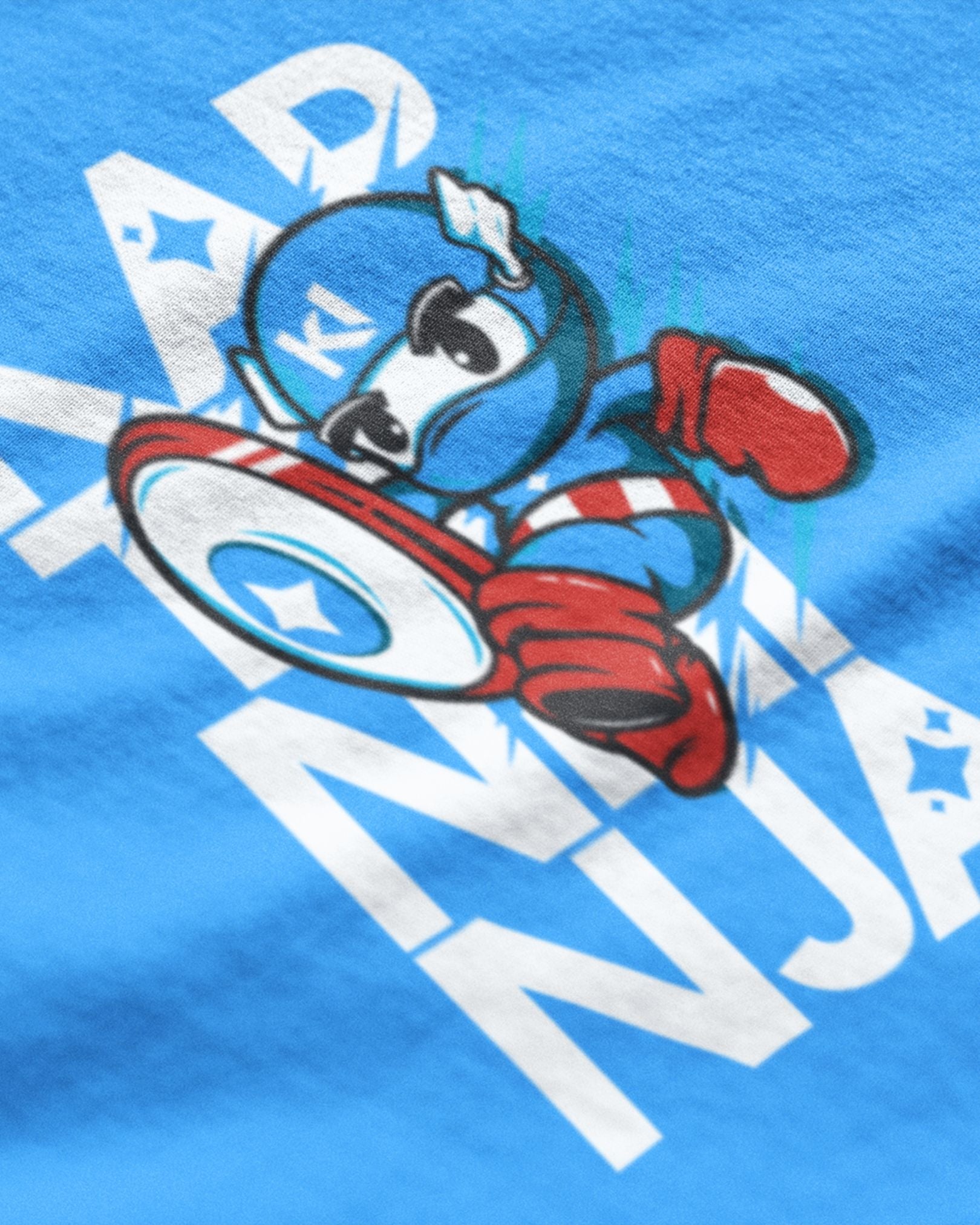 METRO ALIEN Kaptan Ninja graphic t-shirt with cartoon ninja character in blue and red