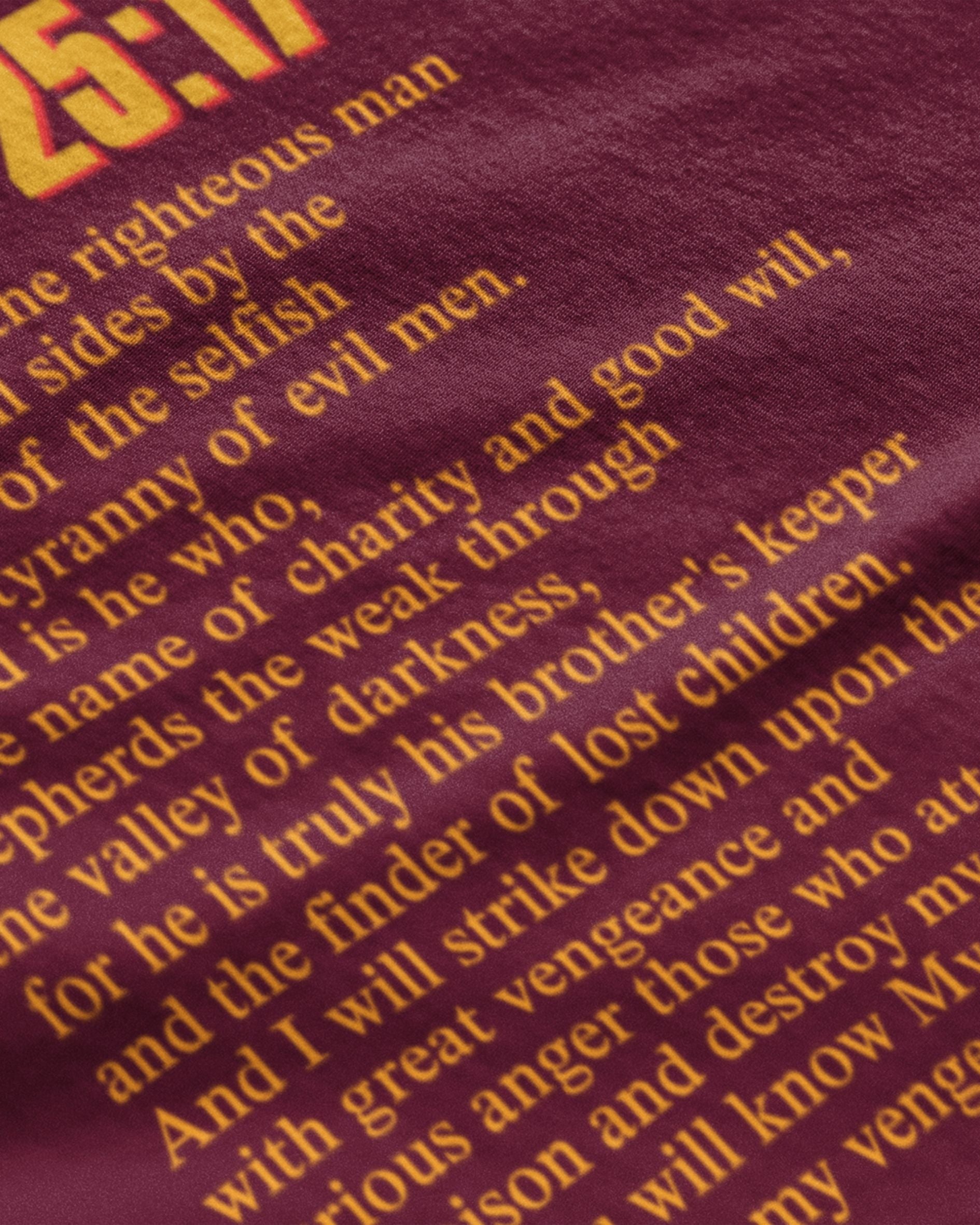 Close-up of maroon movie themed graphic streetwear t-shirt India pulp fiction tshirt india with yellow text print