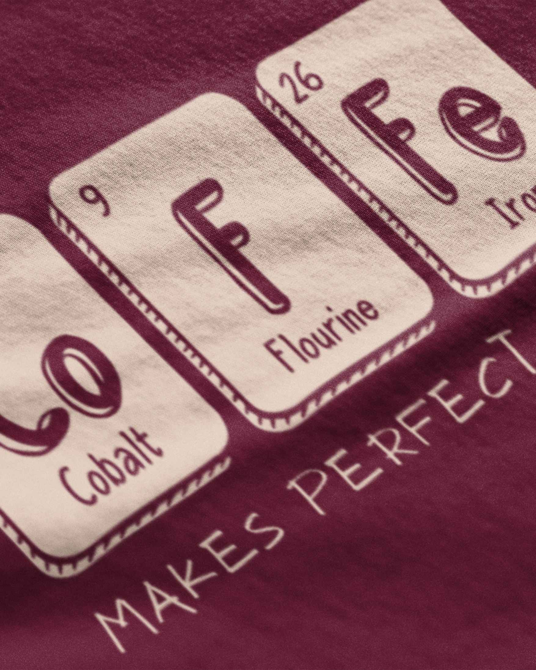 Close-up of METRO ALIEN periodic table coffee graphic t-shirt showing cobalt fluorine and iron elements