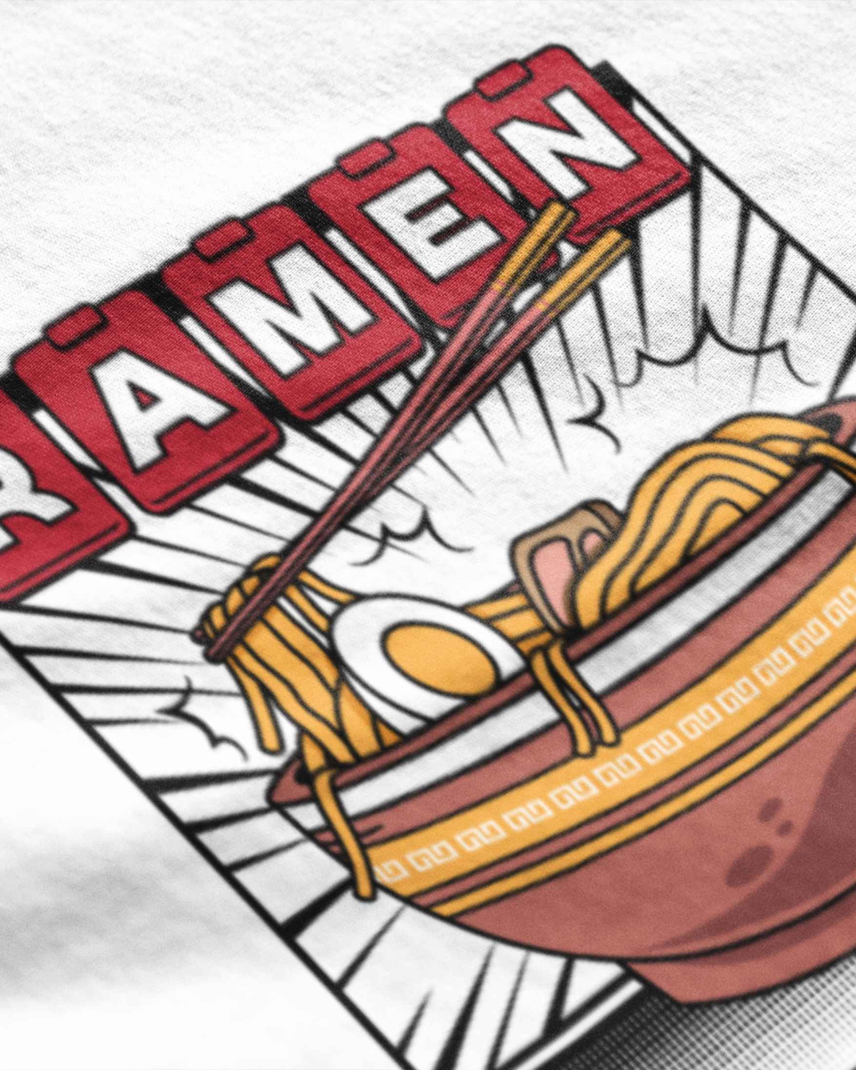 Close-up of METRO ALIEN ramen graphic t-shirt featuring a colorful ramen bowl with noodles, egg, and chopsticks